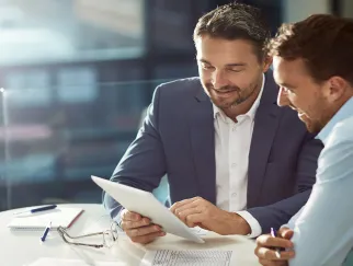 a man looking at a tablet