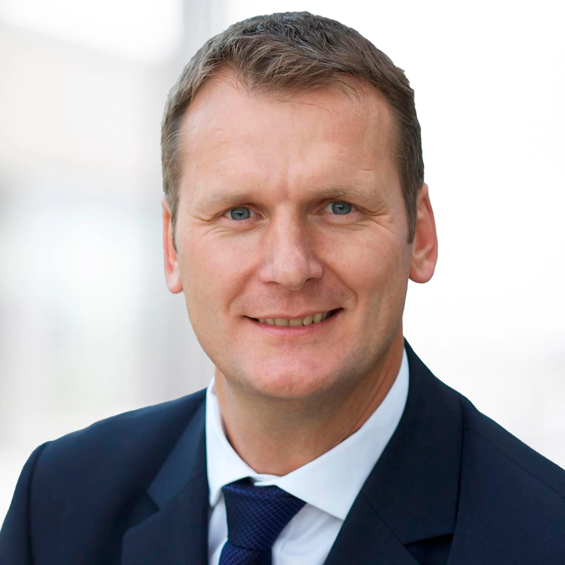 a man in a suit and tie