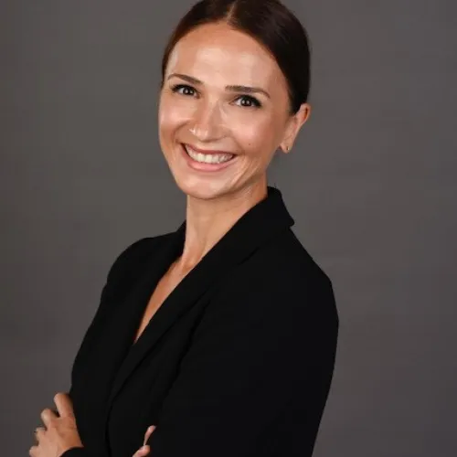 a woman in a black suit